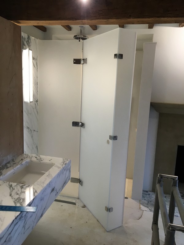Bespoke frosted glass shower enclosure in Roehampton luxury bathroom